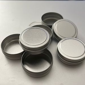 45 count bundle of 1 1/2”round metal containers w/ tops